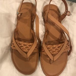 Never worn, TOMS flat sandals.